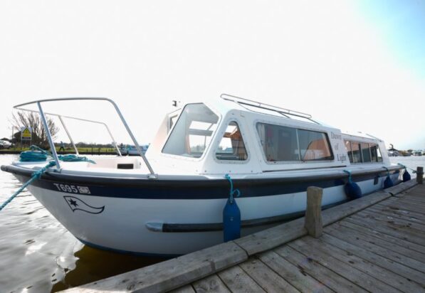 Dawn of Light - River Boat on the broads
